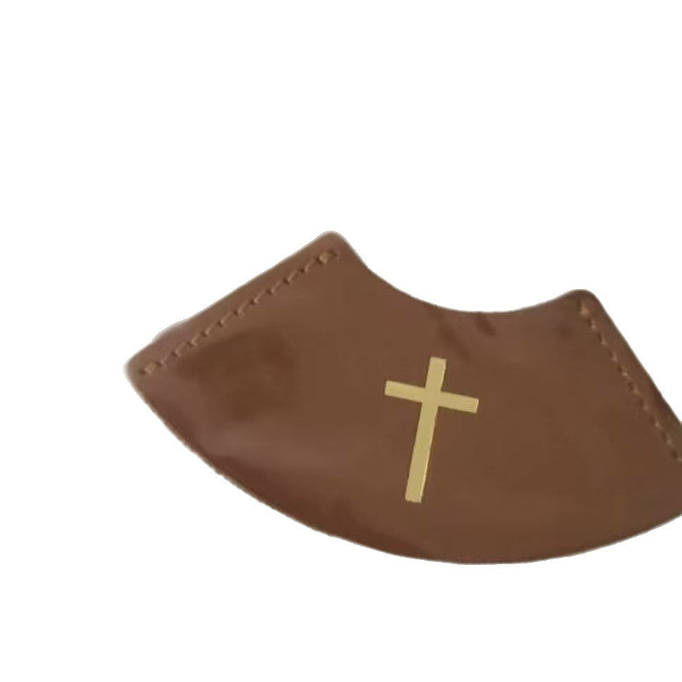 Ein Lesezeichen aus Leder mit biblischem Motiv und Kreuz, religiöses Geschenk